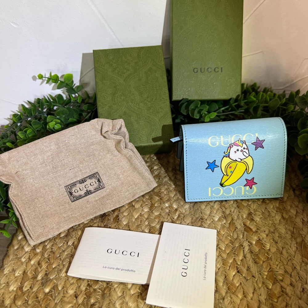 Gucci Light Blue Wallet with Star and Cat Design